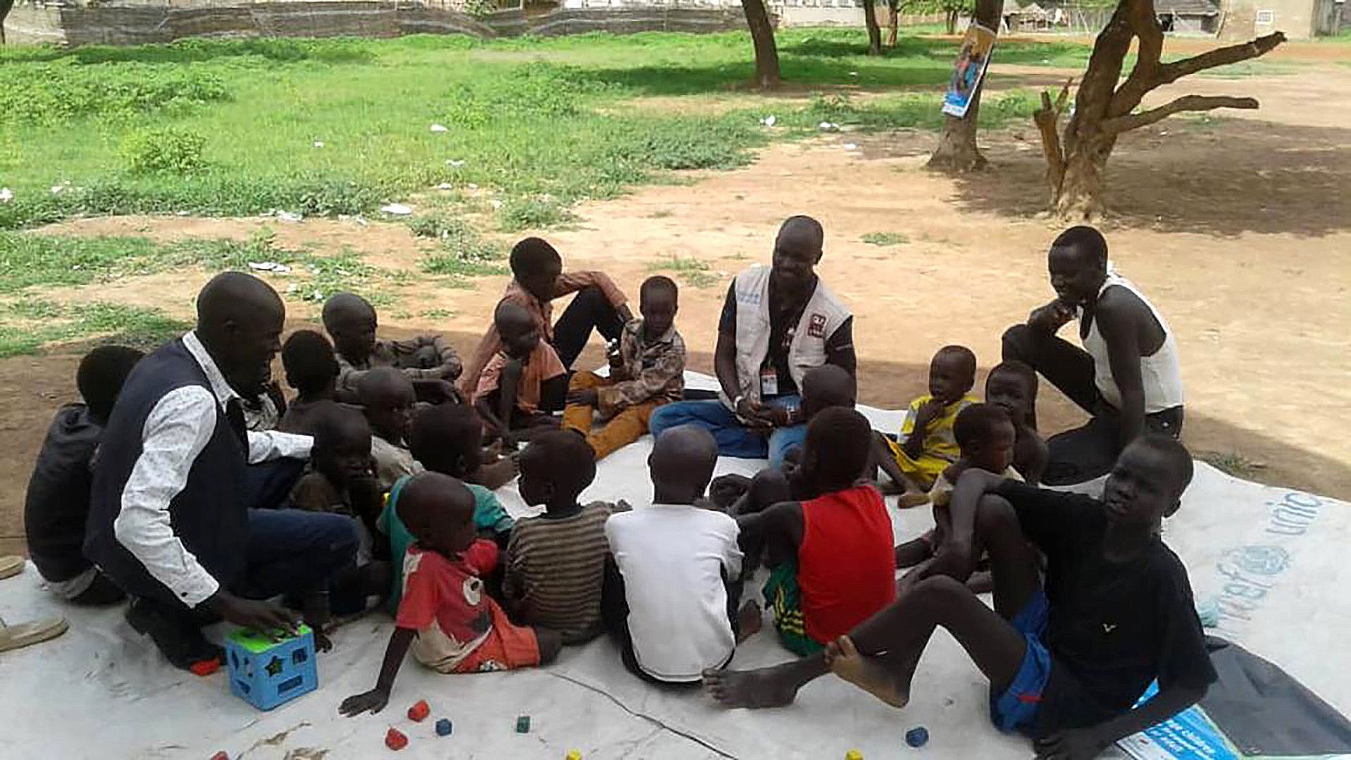 War child officer works on the field with children in South Sudan