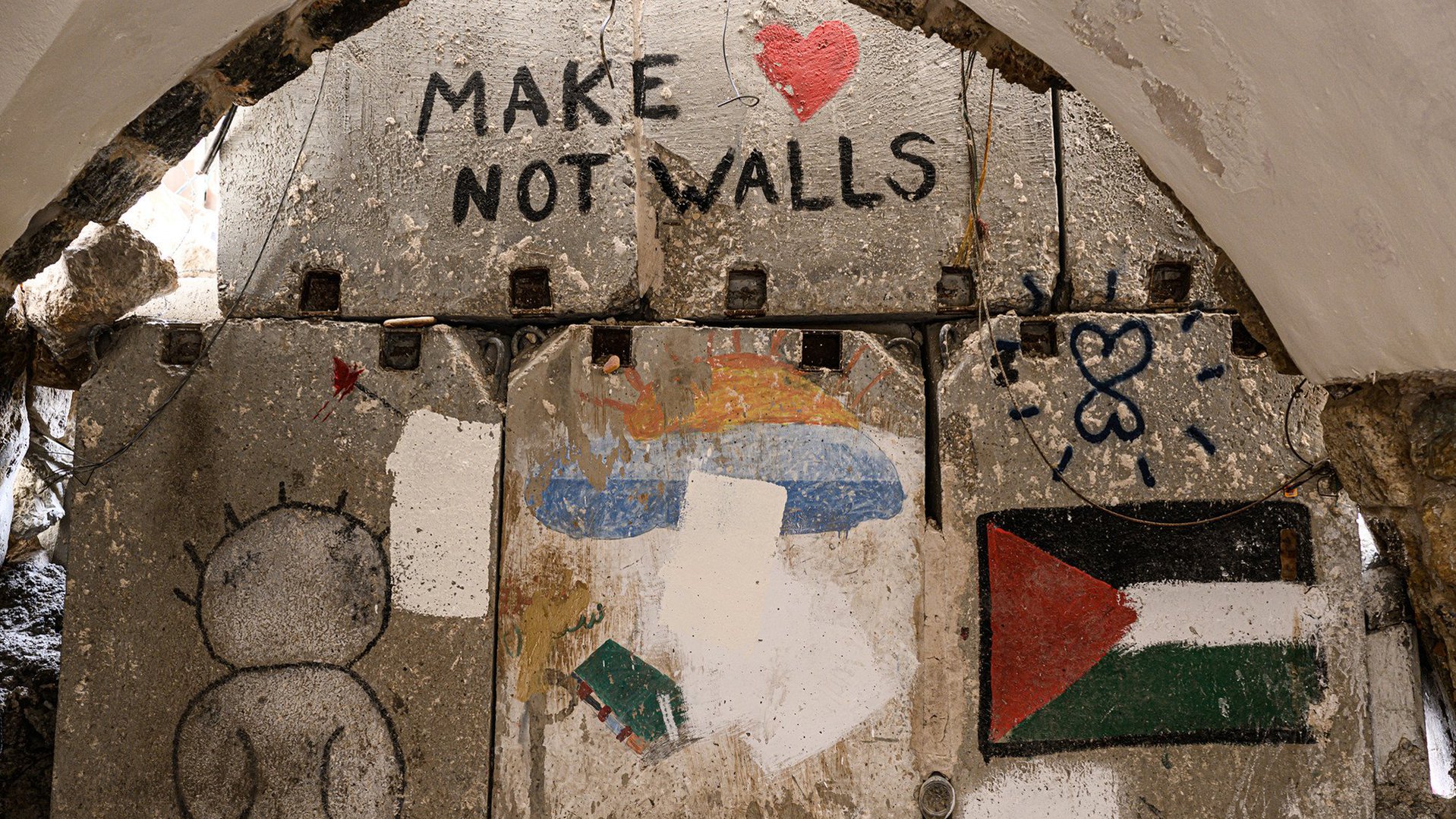 War Child bezette Palestijnse gebieden - muur 'make love not walls' War Child
