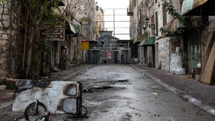 Empty and destroyed street in Hebron, Occupied Palestinian Territory - War Child - No Place for a Child