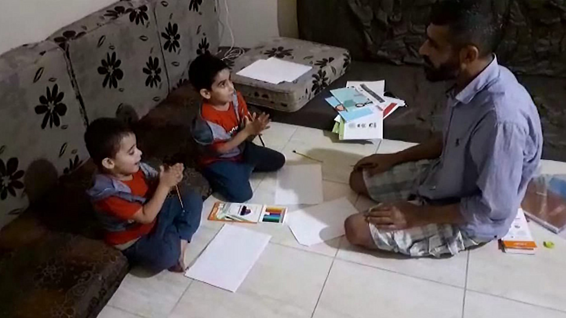 Education at home for Nader's sons in a refugeecamp in Lebanon War Child
