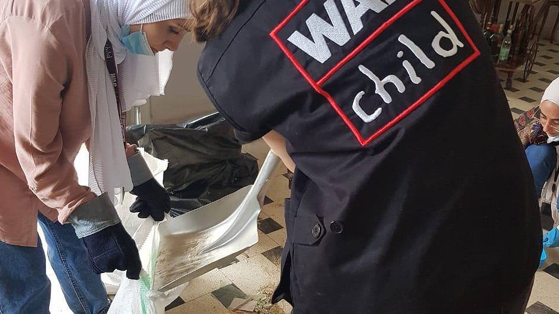 War Child volunteers to clean out houses in Lebanon Beirut after explosions