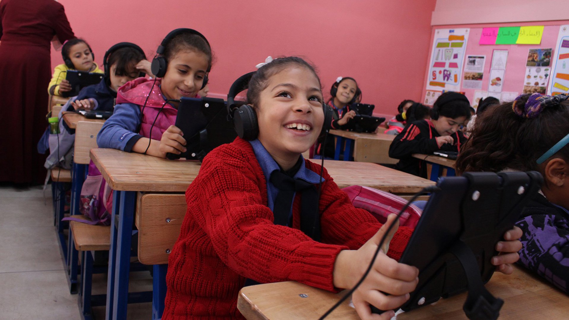 War Child Can't Wait to Learn in Jordan - children education on tablets